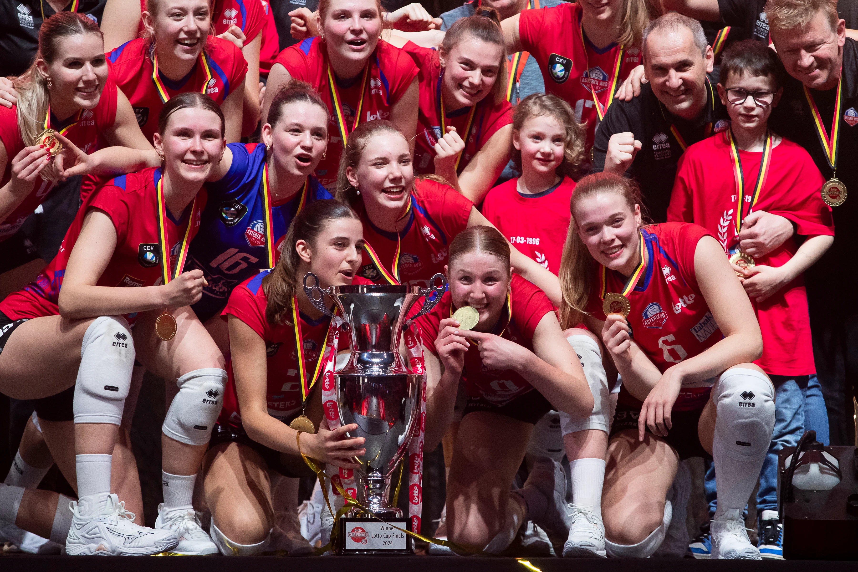 Asterix players and staff celebrate after winning the match between Asterix Avo Beveren and E.S. Charleroi, the final match in the women Belgian volleyball cup competition, Saturday 10 February 2024 in Merksem, Antwerp. BELGA PHOTO KRISTOF VAN ACCOM