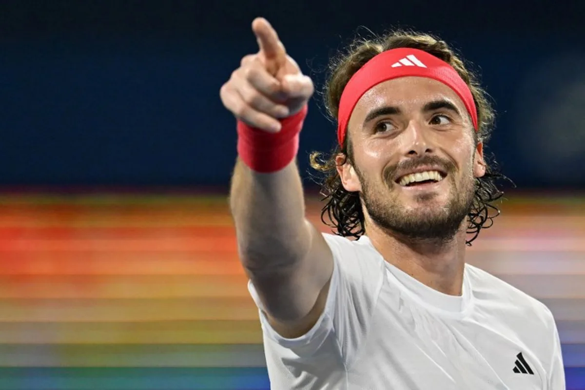 Greece's Stefanos Tsitsipas celebrates after winning the final match of the ATP Dubai Duty Free Tennis Championship against Canada's Felix Auger Aliassime in Dubai on March 1, 2025.  Ryan Lim / AFP