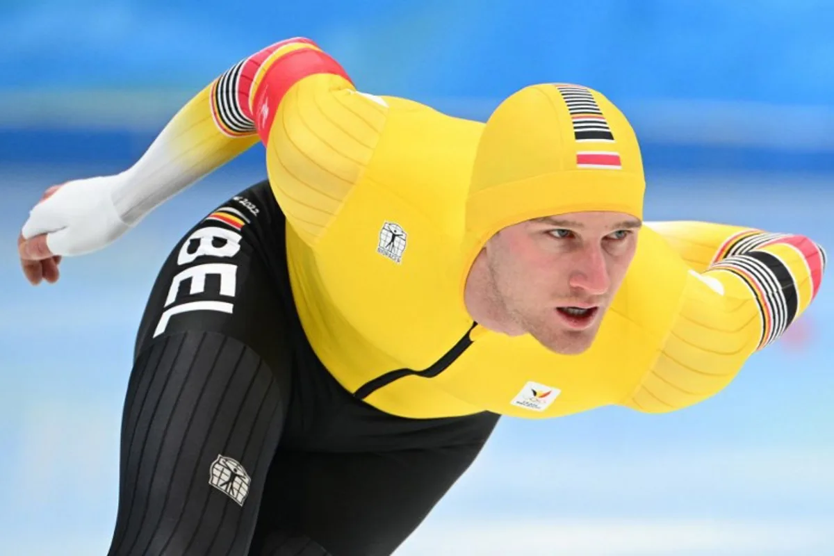 Belgium's Mathias Voste competes in the men's speed skating 1000m event during the Beijing 2022 Winter Olympic Games at the National Speed Skating Oval in Beijing on February 18, 2022.  SEBASTIEN BOZON / AFP