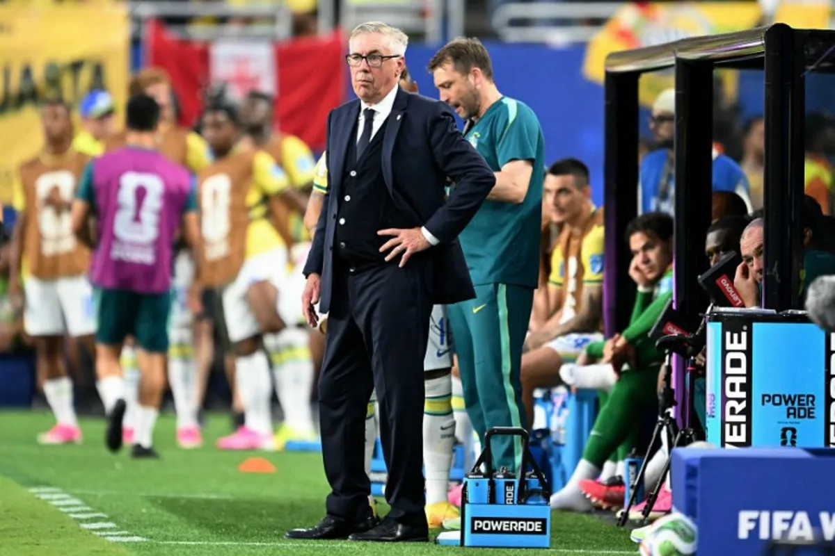 Brazil's Italian head coach Carlo Ancelotti gestures during the 2026 World Cup Group C football match between Scotland and Brazil at the Miami Stadium in Miami Gardens on June 24, 2026.   CHANDAN KHANNA / AFP