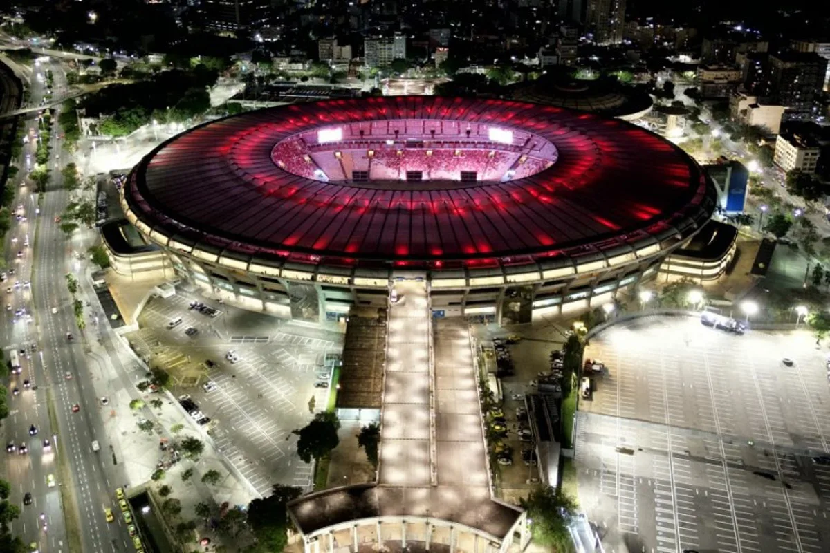 In this aerial view Flamengo fans watch the all-Brazilian Copa Libertadores final between Palmeiras and Flamengo at the Maracana stadium in Rio de Janeiro, Brazil, on November 29, 2025.  Pablo PORCIUNCULA / AFP