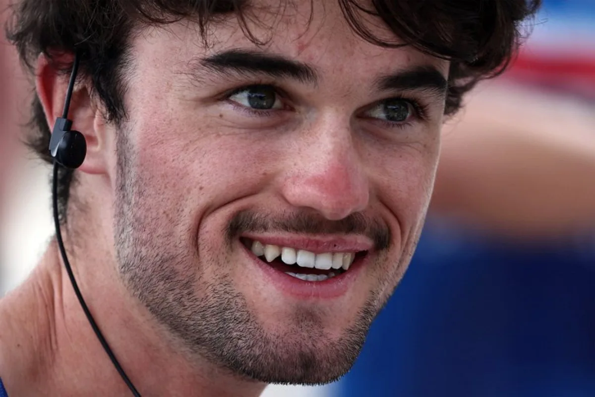 France's Antoine Huby (Soudal Quick-Step) smiles before the start of the third stage of the Tour of Oman, shortened to 76 kilometres between Naseem Garden and al-Bustan due to weather conditions, in Muscat on February 12, 2024.  Anne-Christine POUJOULAT / AFP