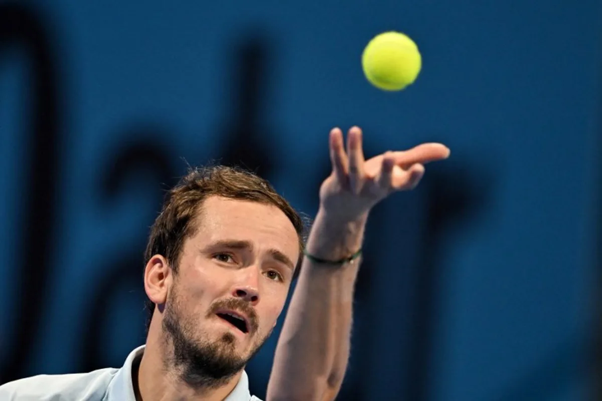 Russia's Daniil Medvedev serves against Russia's Karen Khachanov during their men's singles match at the ATP Qatar Open tennis tournament in Doha on February 18, 2025.  Mahmud HAMS / AFP