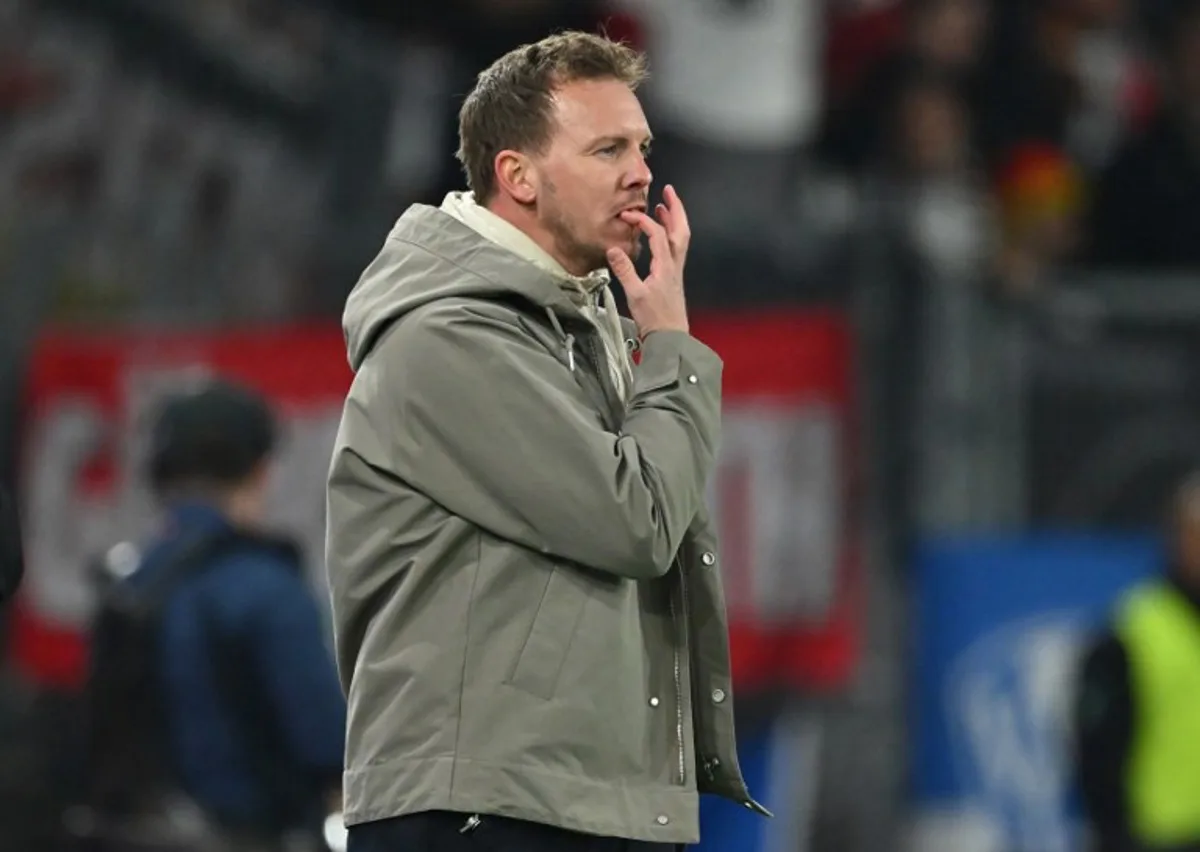 Germany's headcoach Julian Nagelsmann reacts during the international friendly football match between Switzerland and Germany at St. Jakob-Park in Basel, Switzerland on March 27, 2026.  Fabrice COFFRINI / AFP