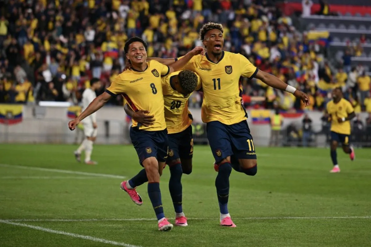 Ecuador's forward #08 Anthony Valencia, Ecuador's forward #20 Nilson Angulo and Ecuador's forward #11 Kevin Rodriguez celebrate after Valencia scored Ecuador's second goal during a friendly football match between Ecuador and Saudi Arabia at Sports Illustrated Stadium, in Harrison, New Jersey, on May 30, 2026. ANGELA WEISS / AFP