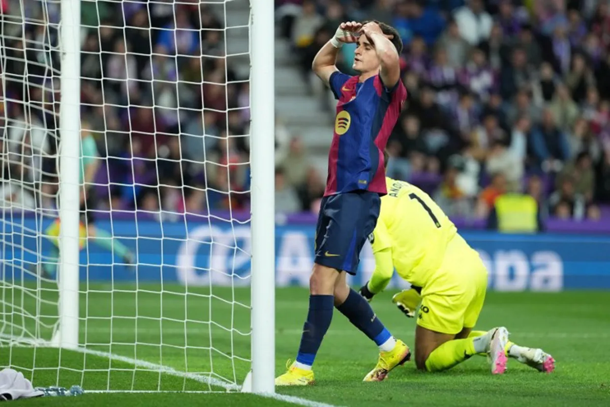 Barcelona's Spanish forward #18 Pau Victor Delgado reacts to missing a goal opportunity during the Spanish league football match between Real Valladolid FC and FC Barcelona at the Jose Zorrilla stadium in Valladolid on May 3, 2025. Cesar Manso / AFP