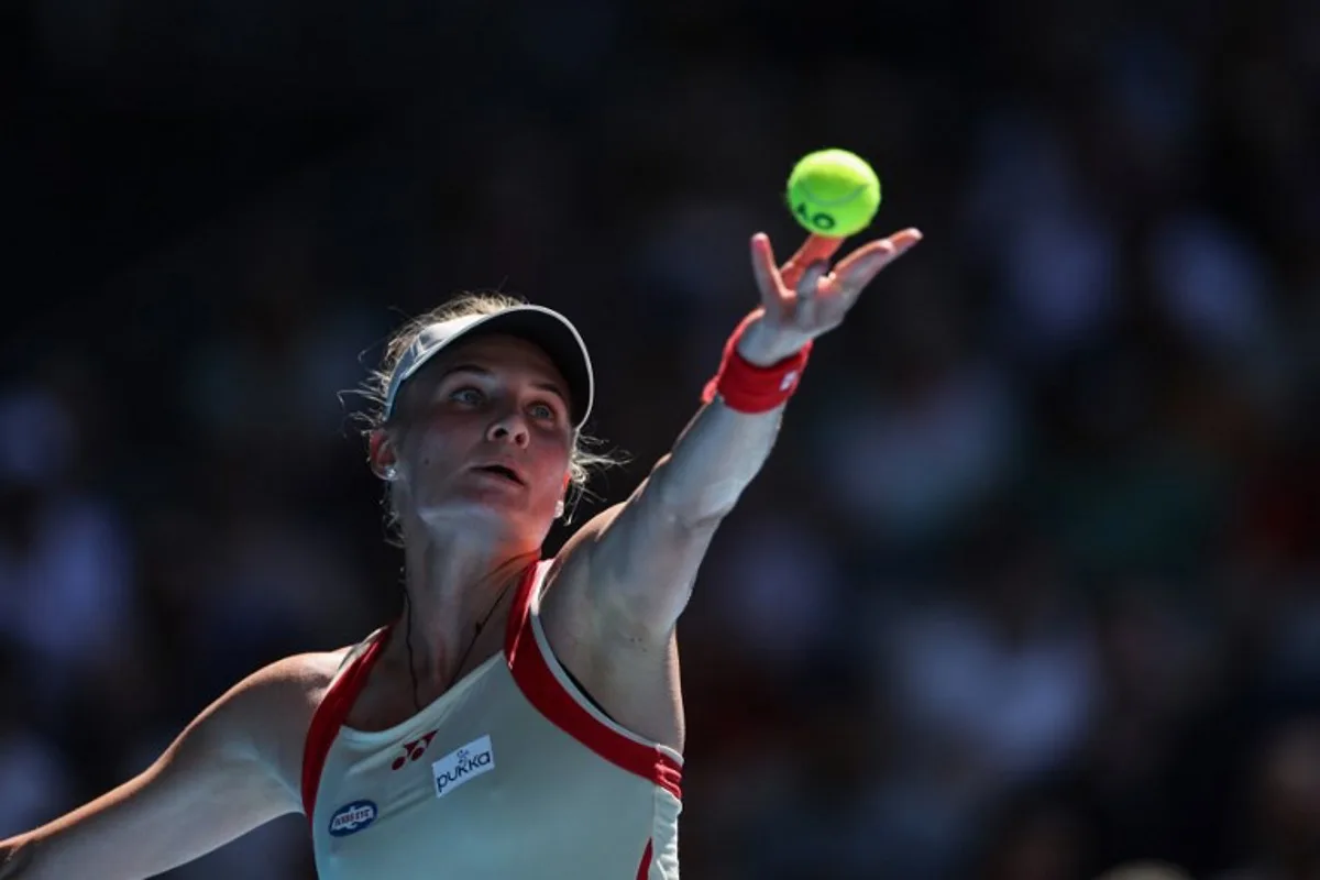 Ukraine's Dayana Yastremska serves against Kazakhstan's Elena Rybakina during their women's singles match on day seven of the Australian Open tennis tournament in Melbourne on January 18, 2025.  Adrian DENNIS / AFP