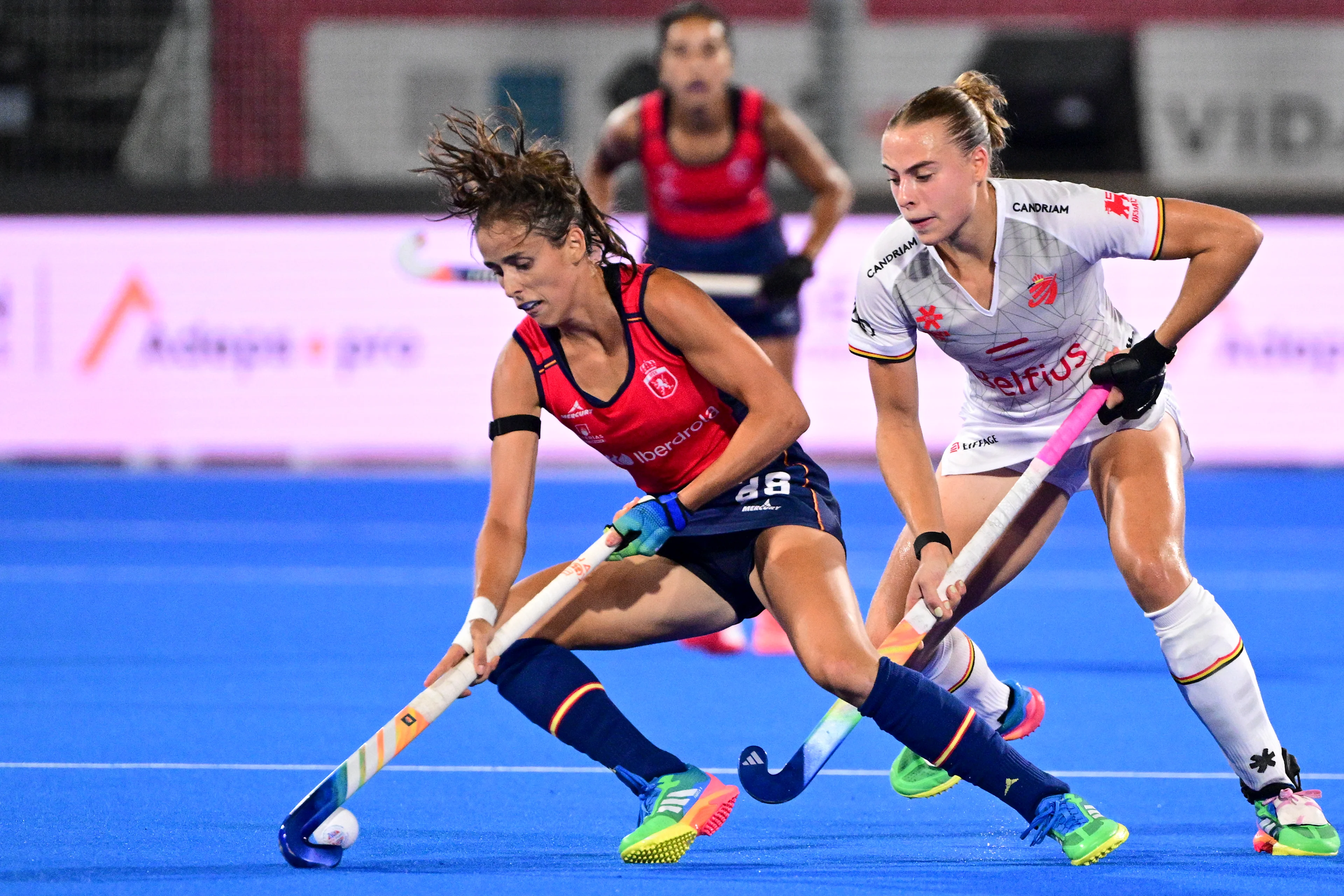 Spanish Paula Jimenez and Belgium's Camille Belis pictured during a field hockey game between Belgian national team Red Panthers and Spain during the group stage of the women's 2026 Hockey World Cup, on Tuesday 18 August 2026, in Wavre. The 2026 edition of the Hockey World Cup takes place in Belgium and The Netherlands from August 15 to August 30. BELGA PHOTO DIRK WAEM