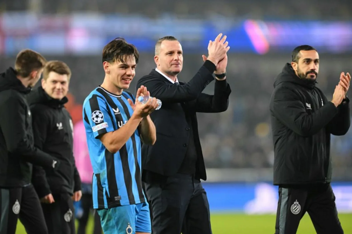 Club Brugge's Belgian coach Nicky Hayen (C) applauds after a draw in the  UEFA Champions League, league phase matchday 7, football match between Club Brugge KV and Juventus FC at the Jan Breydel Stadium in Bruges, on January 21, 2025.  NICOLAS TUCAT / AFP