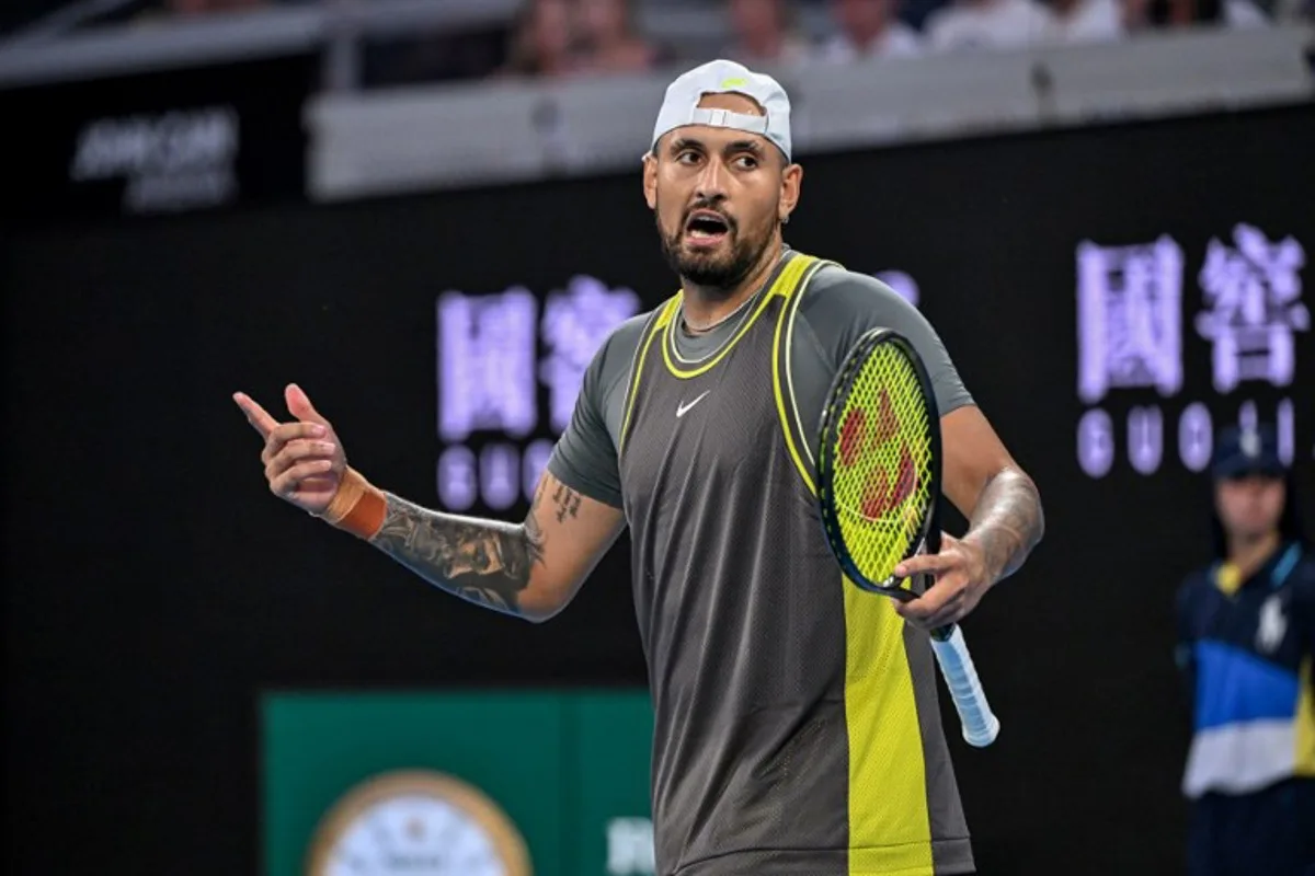 Australia's Nick Kyrgios reacts between points against Britain's Jacob Fearnley during their men's singles match on day two of the Australian Open tennis tournament in Melbourne on January 13, 2025.  WILLIAM WEST / AFP