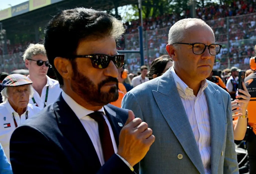 FIA President Mohammed Ben Sulayem (L) walks with Italian CEO of the Formula One Group Stefano Domenicali ahead of the Italian Formula One Grand Prix at the Autodromo Nazionale Monza circuit in Monza, northern Italy on September 6, 2026.  Andrej ISAKOVIC / AFP