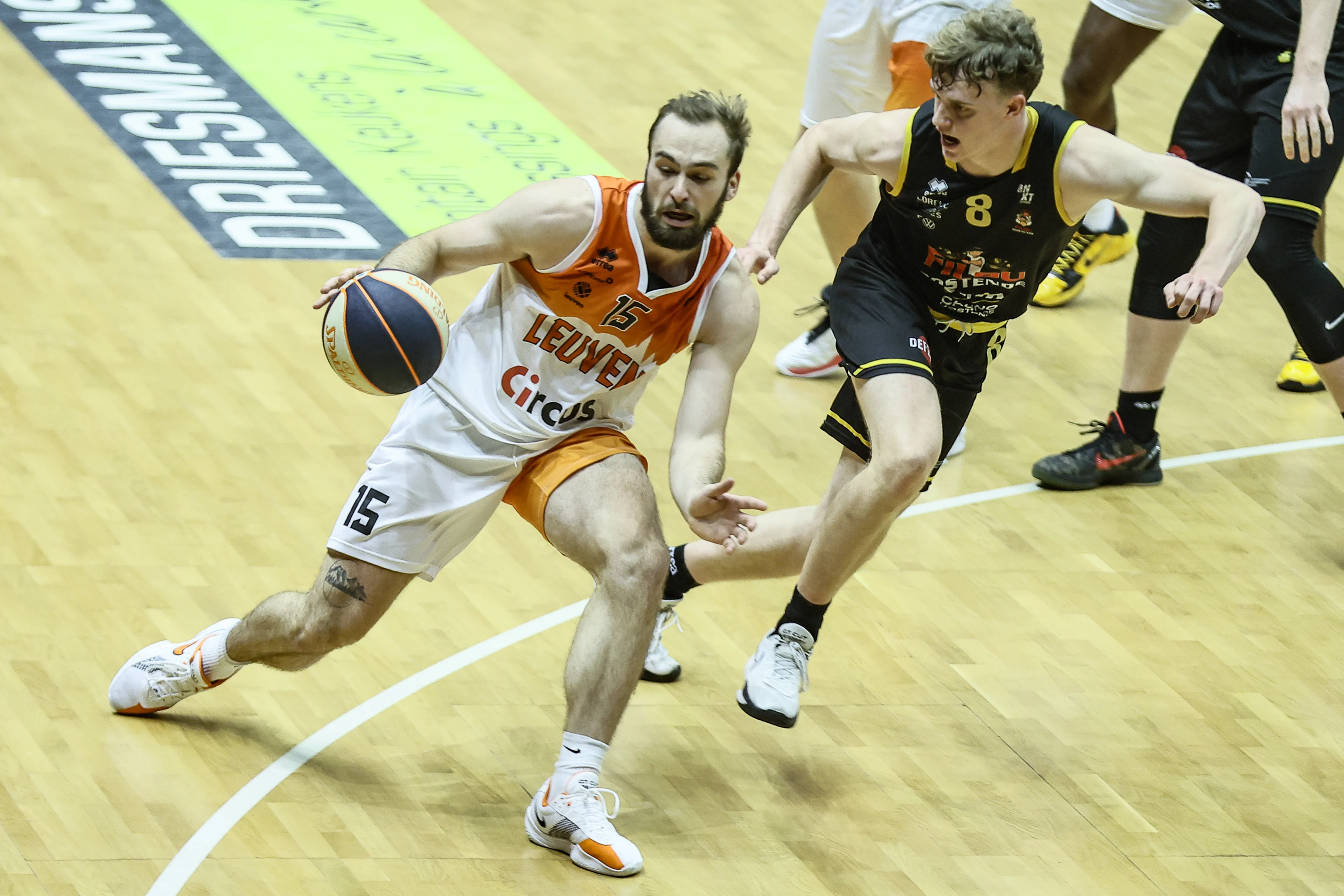 Leuven's Noah Freidel and Oostende's Joppe Mennes fight for the ball during a basketball match between Leuven Bears and BC Oostende, Saturday 09 November 2024 in Leuven, on day 10 of the 'BNXT League' Belgian/ Dutch first division basket championship. BELGA PHOTO BRUNO FAHY