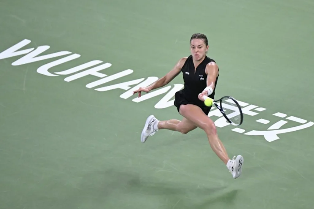 Poland's Maja Chwalinska hits a return to Poland's Iga Swiatek during their women's singles semi-final match at the Wuhan Open tennis tournament in Wuhan, China's Hubei province on October 17, 2026. WANG Zhao / AFP