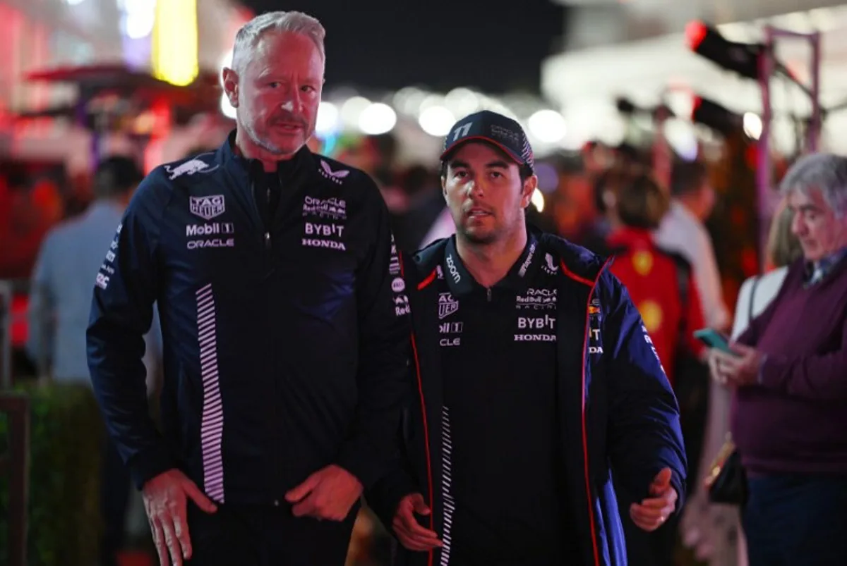 Red Bull Racing's Mexican driver Sergio Perez (R) and Red Bull Racing's British Sporting Director Jonathan Wheatley arrive in the paddock for a drivers' meeting before the third practice session for the Las Vegas Formula One Grand Prix on November 17, 2023, in Las Vegas, Nevada.   Jim WATSON / AFP