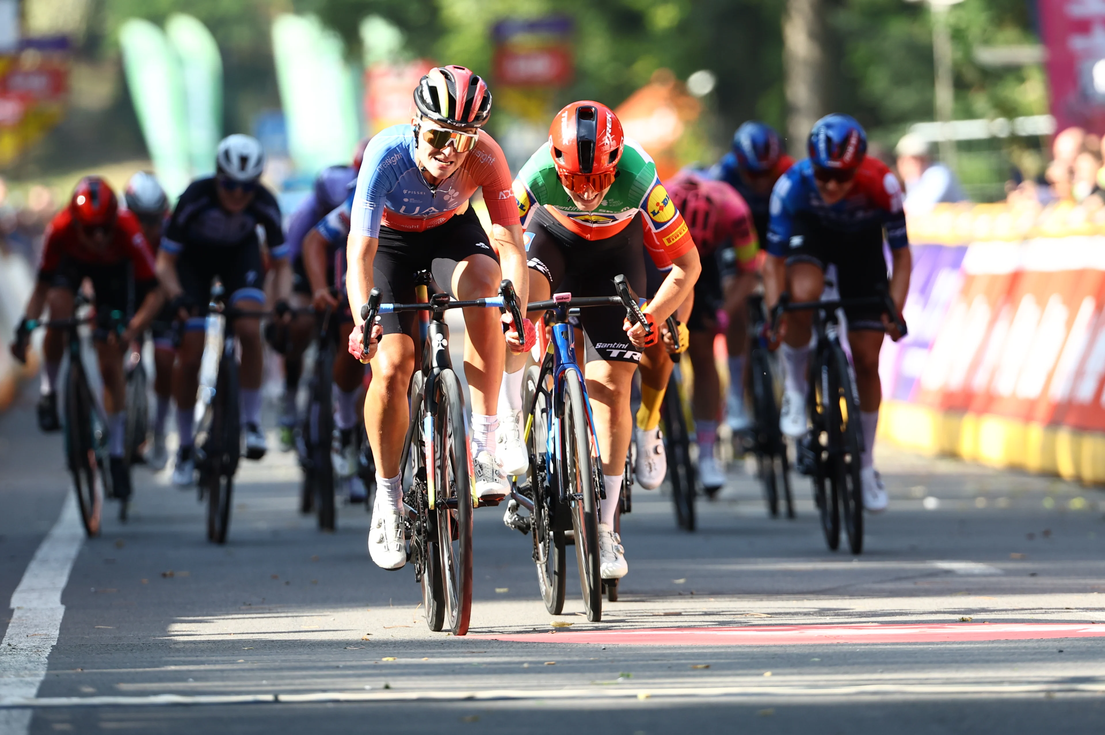 Dutch Karlijn Swinkels of UAE Team ADQ and Italian Elisa Longo Borghini of Lidl-Trek pictured in action at the finish line of and the one day cycling race Grand Prix de Wallonie 2024 (139,3 km), from Blegny to the Citadelle de Namur, in Namur, on Wednesday 18 September 2024.  BELGA PHOTO DAVID PINTENS