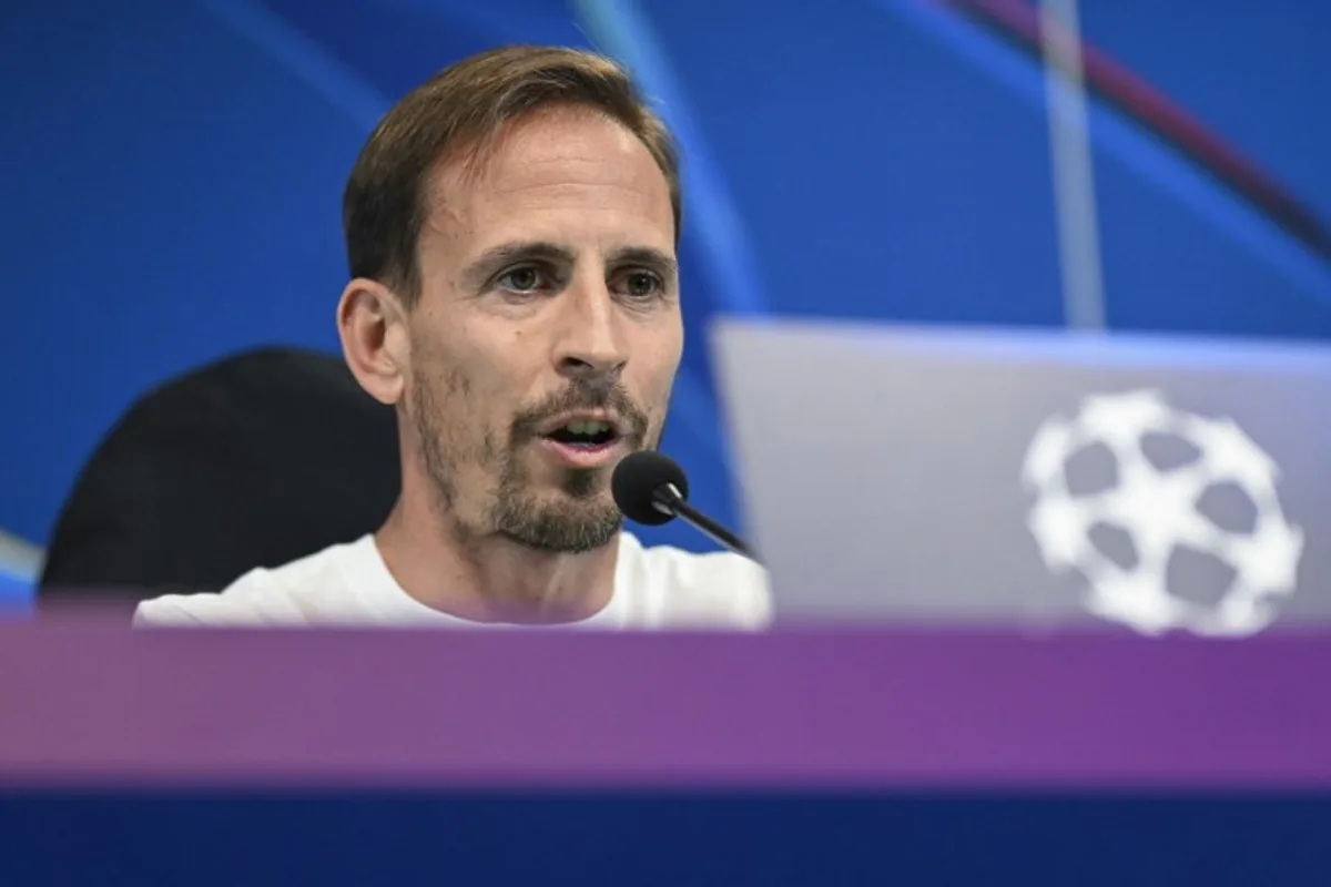 Sporting's coach Joao Pereira gives a press conference on the eve of their UEFA Champions League football match against Arsenal FC at Alvalade stadium in Lisbon, on November 25, 2024.   Patricia DE MELO MOREIRA / AFP