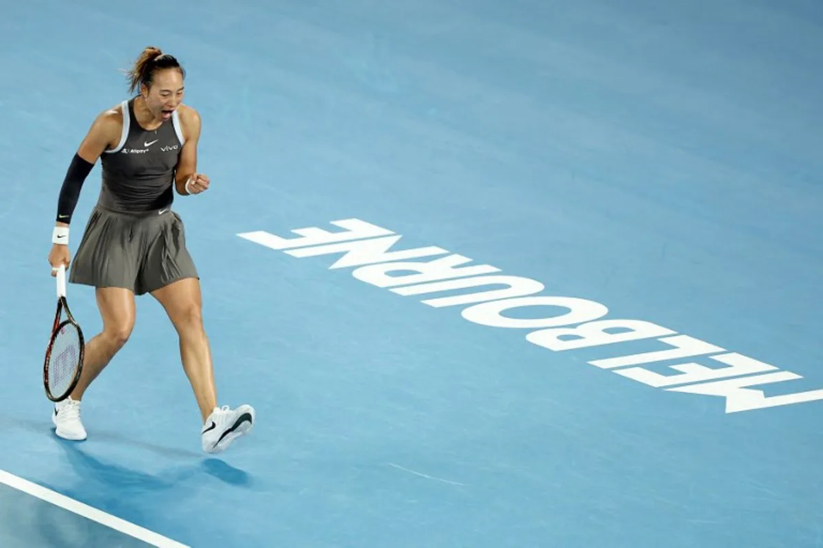 China's Zheng Qinwen reacts on a point against Romania's Anca Todoni during their women's singles match on day one of the Australian Open tennis tournament in Melbourne on January 12, 2025.  Martin KEEP / AFP