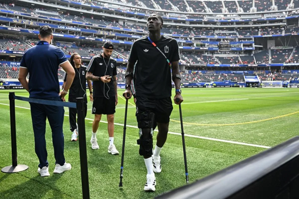 Amadou Belgium's midfielder #24 Amadou Onana walks on the pitch ahead of the 2026 World Cup football tournament quarter-final match between Spain and Belgium at the Los Angeles Stadium in Inglewood on July 10, 2026. Paul ELLIS / AFP