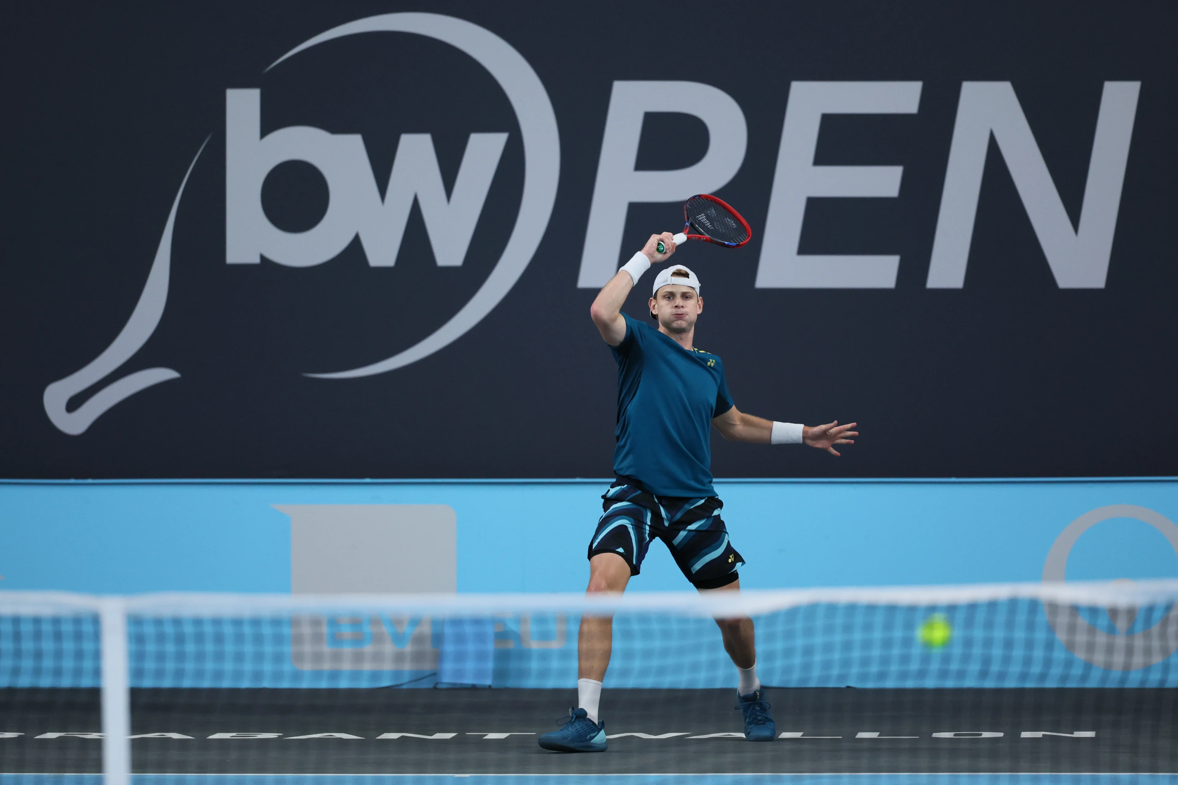 Belgian Zizou Bergs pictured in action during a tennis match against his compatriot Goffin, in the first round of the men's singles at the BW Open ATP Challenger 125 tournament, in Louvain-la-Neuve,  Tuesday 23 January 2024. THE BW Open takes place from 22 to 28 January.  BELGA PHOTO BENOIT DOPPAGNE