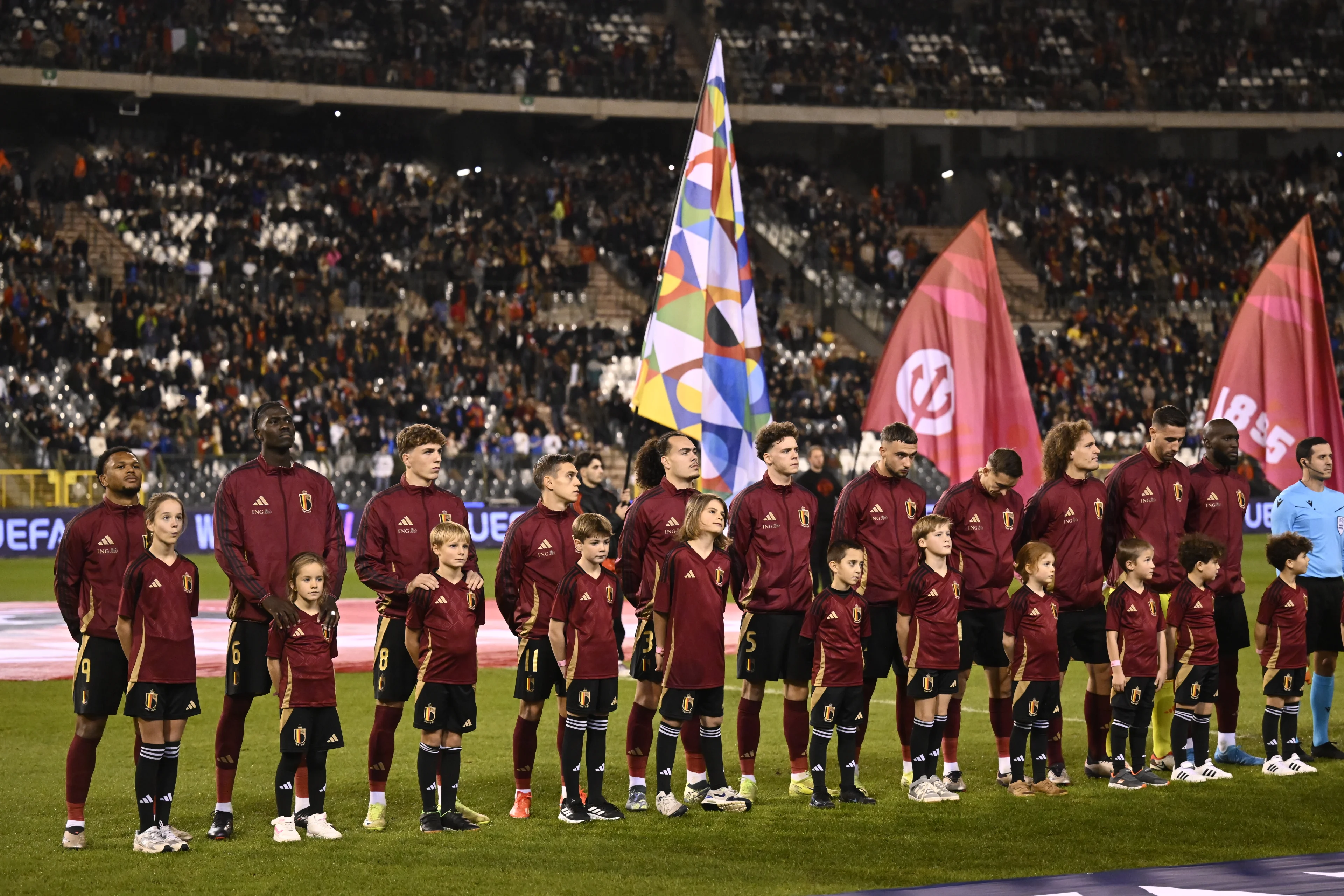 Belgium's players pictured during the national anthem before a soccer game between Belgian national soccer team Red Devils and Italy, match 5 (out of 6) in the League A Group 2 of the UEFA Nations League 2025 competition, Thursday 14 November 2024 in Brussels. BELGA PHOTO DIRK WAEM