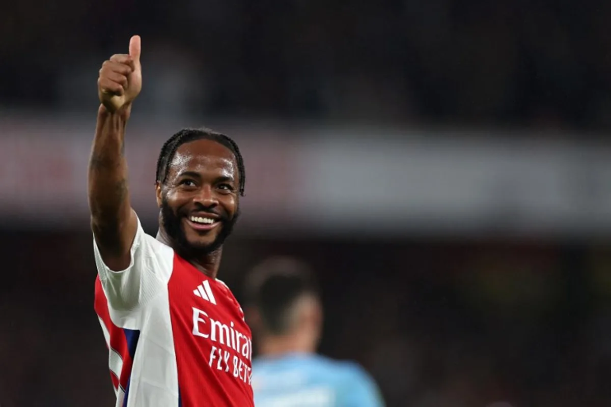 Arsenal's English midfielder #10 Raheem Sterling celebrates scoring the team's fourth goal during the English League Cup third round football match between Arsenal and Bolton Wanderers' at the Emirates Stadium, in London on September 25, 2024.  Adrian Dennis / AFP