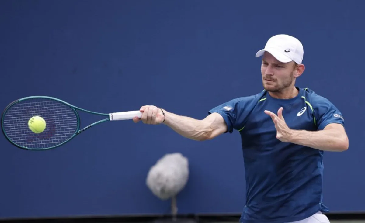 Belgium's David Goffin hits a return to Czech Republic's Tomas Machac during their men's singles third round match on day six of the US Open tennis tournament at the USTA Billie Jean King National Tennis Center in New York City, on August 31, 2024.  Kena Betancur / AFP