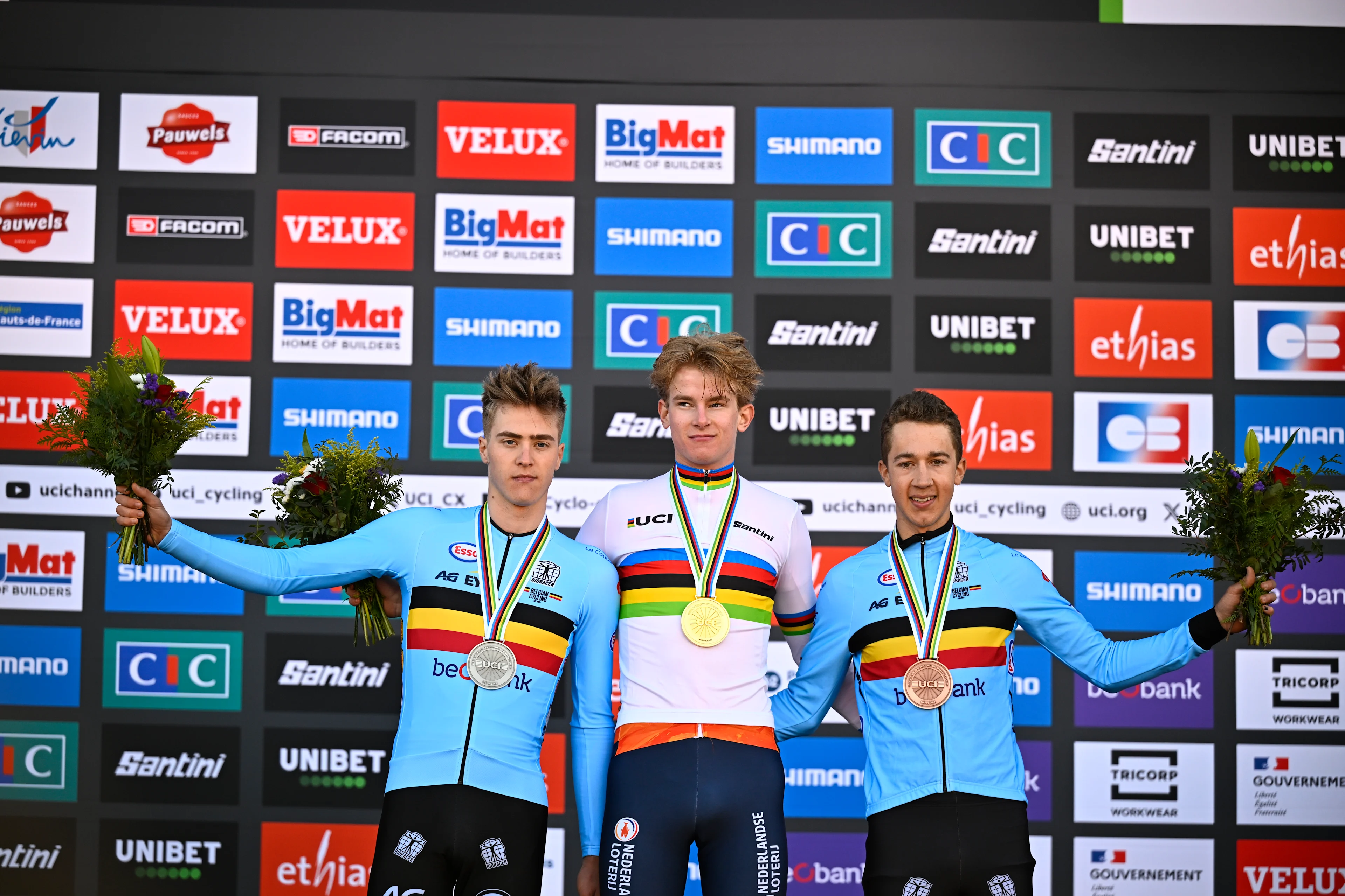 Belgian Kay De Bruyckere, Dutch Tibor Del Grosso and Belgian Jente Michels celebrate on the podium after the men U23 race, at the UCI Cyclocross World Championships, in Lievin, France, Saturday 01 February 2025. The world championships are taking place from 31 January until 02 February. BELGA PHOTO JASPER JACOBS