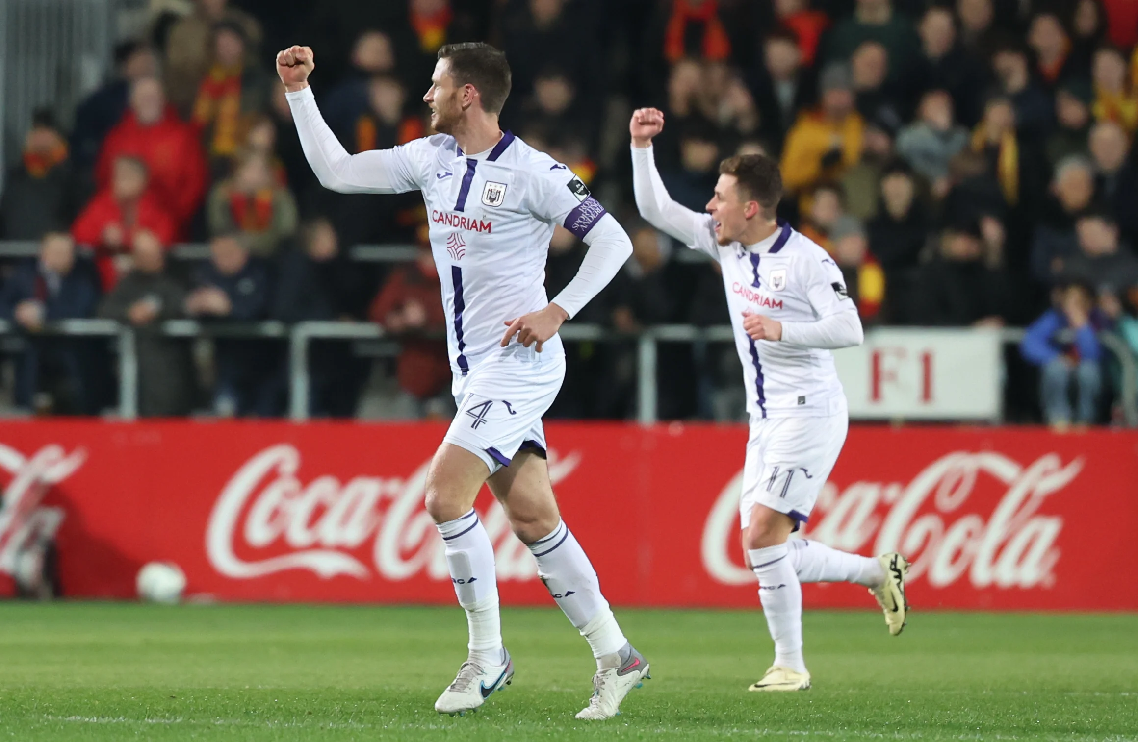 Anderlecht's Jan Vertonghen and Anderlecht's Thorgan Hazard celebrate after scoring during a soccer match between KV Mechelen and RSC Anderlecht Thursday 01 February 2024 in Mechelen, on day 23 of the 2023-2024 season of the 'Jupiler Pro League' first division of the Belgian championship. BELGA PHOTO VIRGINIE LEFOUR