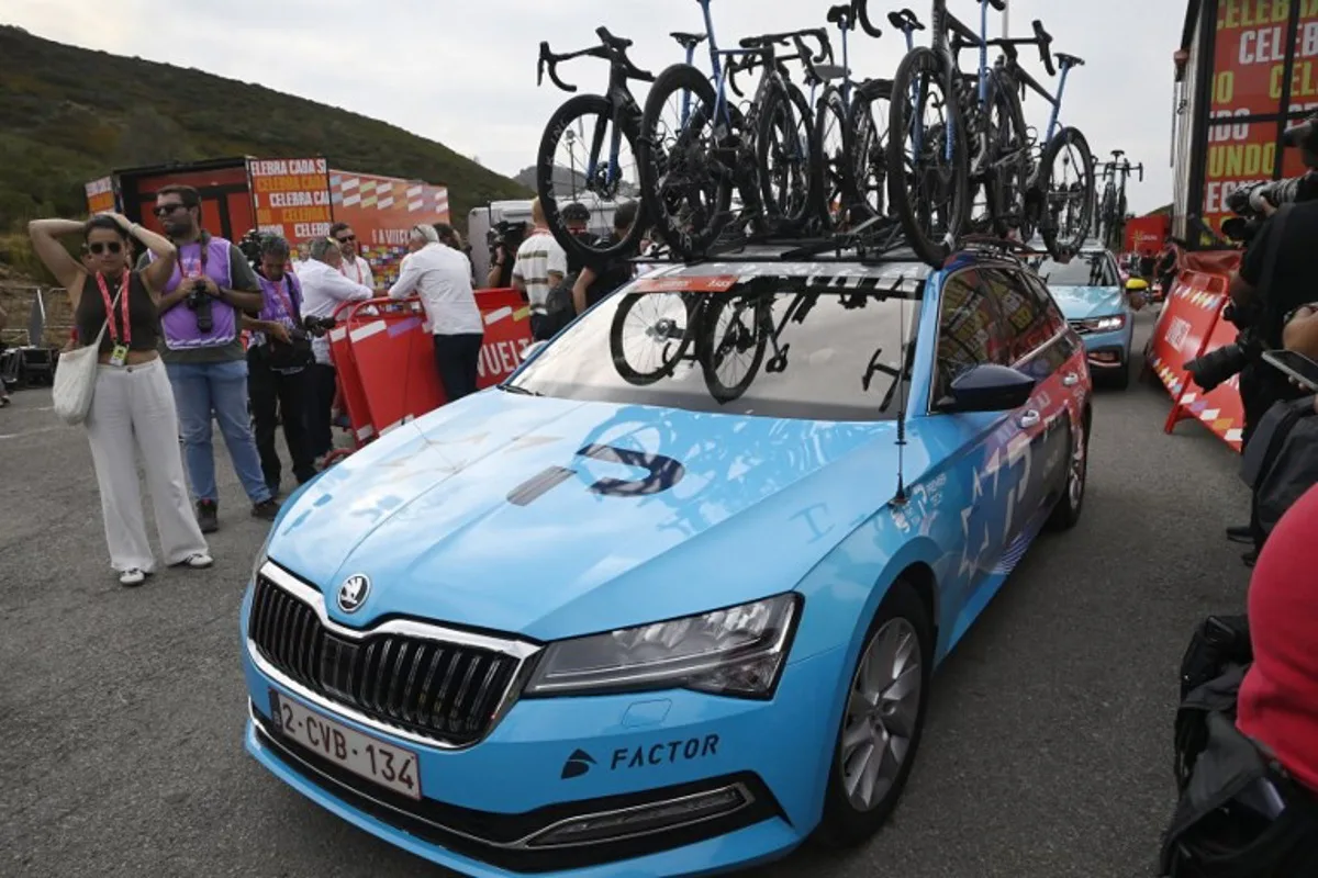 Israel Premier Tech's team car is seen after the 14th stage of the Vuelta a Espana cycling tour, a 135 km race between Aviles and La Farrapona in Somiedo, on September 6, 2025. Cycling team Israel-Premier Tech removed their name from their kit at the Vuelta a Espana today after pro-Palestine protests aimed at them during the race. Miguel RIOPA / AFP