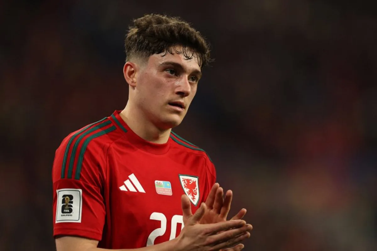 Wales' midfielder #20 Daniel James applauds the fans as he leaves the pitch after being substituted off during the 2026 World Cup Group J qualifier football match between Wales and Kazakhstan, at Cardiff City Stadium, in Cardiff, on March 22, 2025. Adrian Dennis / AFP