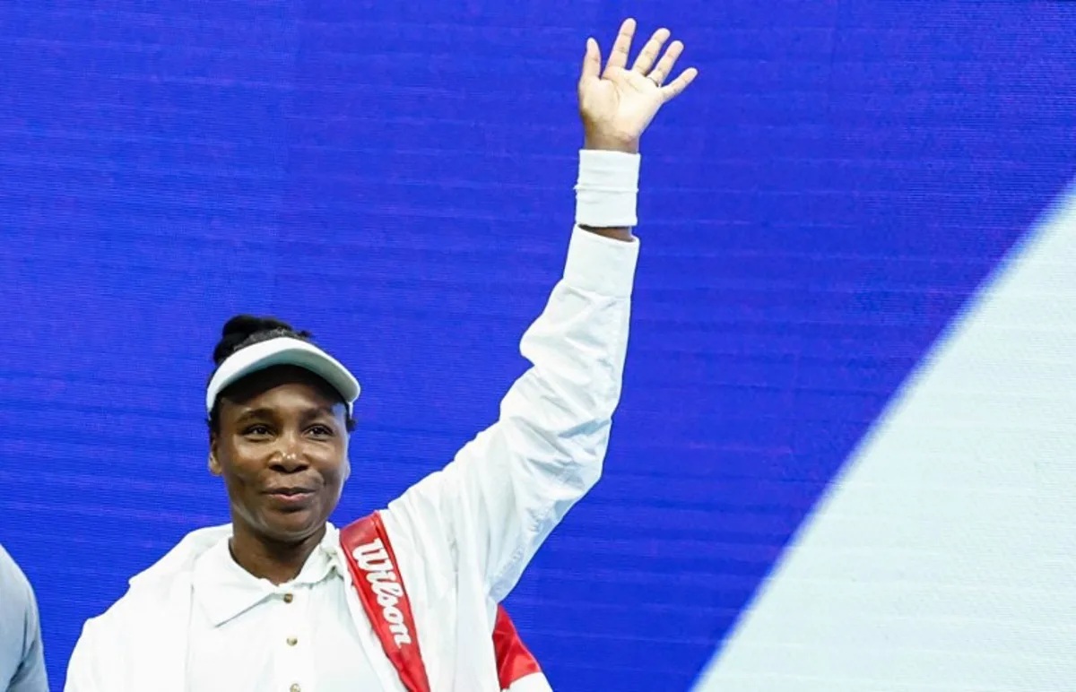 USA's Venus Williams waves at supporters after losing against Czech Republic's Karolina Muchova at the end of their women's singles first round tennis match on day two of the US Open tennis tournament at the USTA Billie Jean King National Tennis Center in New York City, on August 25, 2025. Kena Betancur / AFP