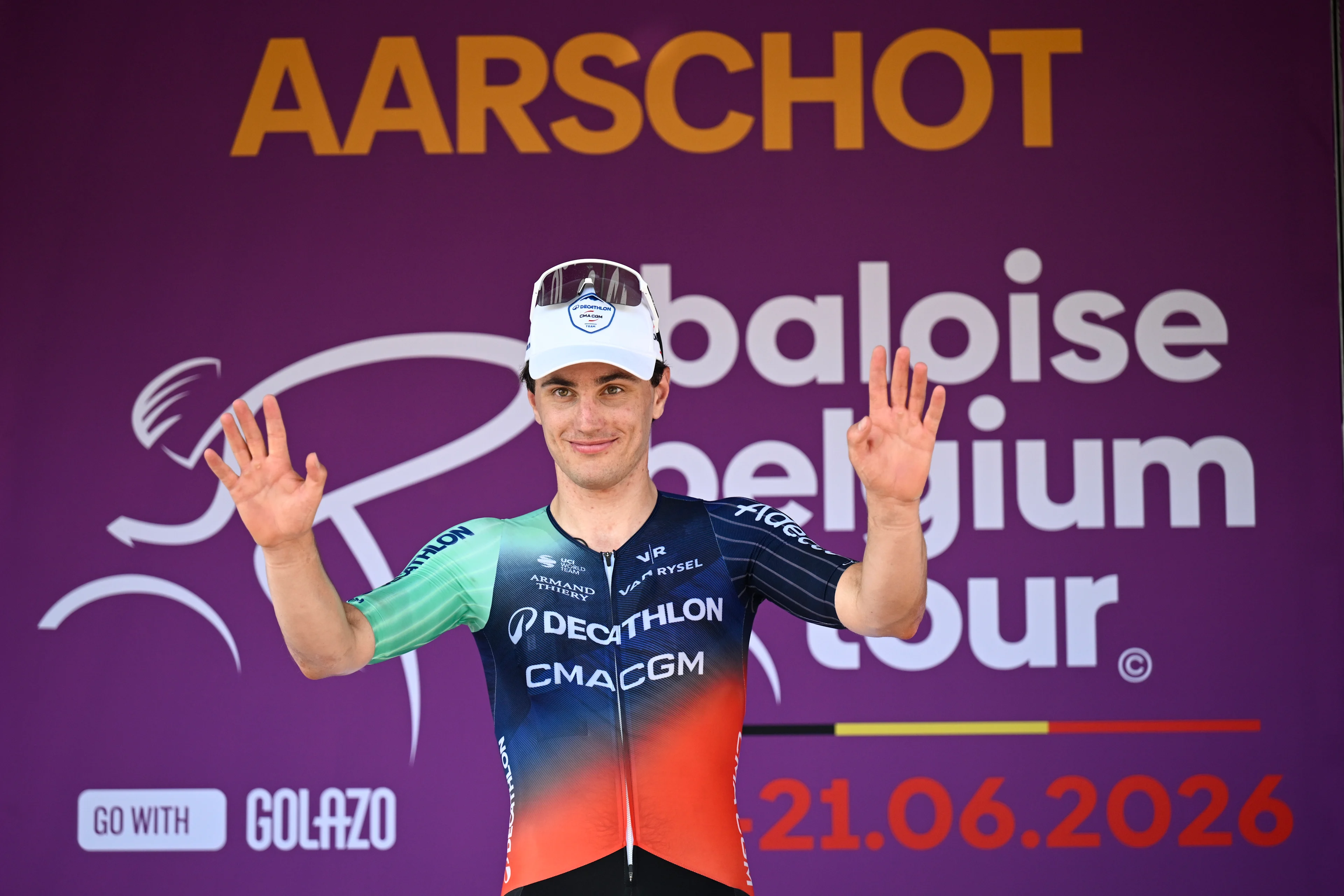 Dutch Olav Kooij of Decathlon CMA CGM Team celebrates on the podium after winning stage 4 of the Baloise Belgium Tour cycling race, 183,5km from Begijnendijk to Aarschot, on Saturday 20 June 2026. The Baloise Belgium Tour takes place from 17 to 21 June. BELGA PHOTO JASPER JACOBS