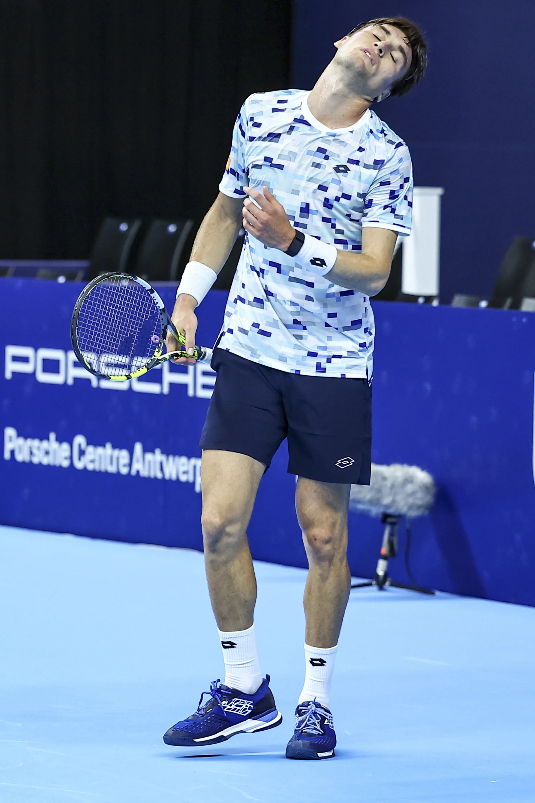 Belgian Raphael Collignon looks dejected during a tennis match in the round of 32 of the singles competition at the ATP European Open Tennis tournament in Antwerp, Monday 14 October 2024. BELGA PHOTO DAVID PINTENS