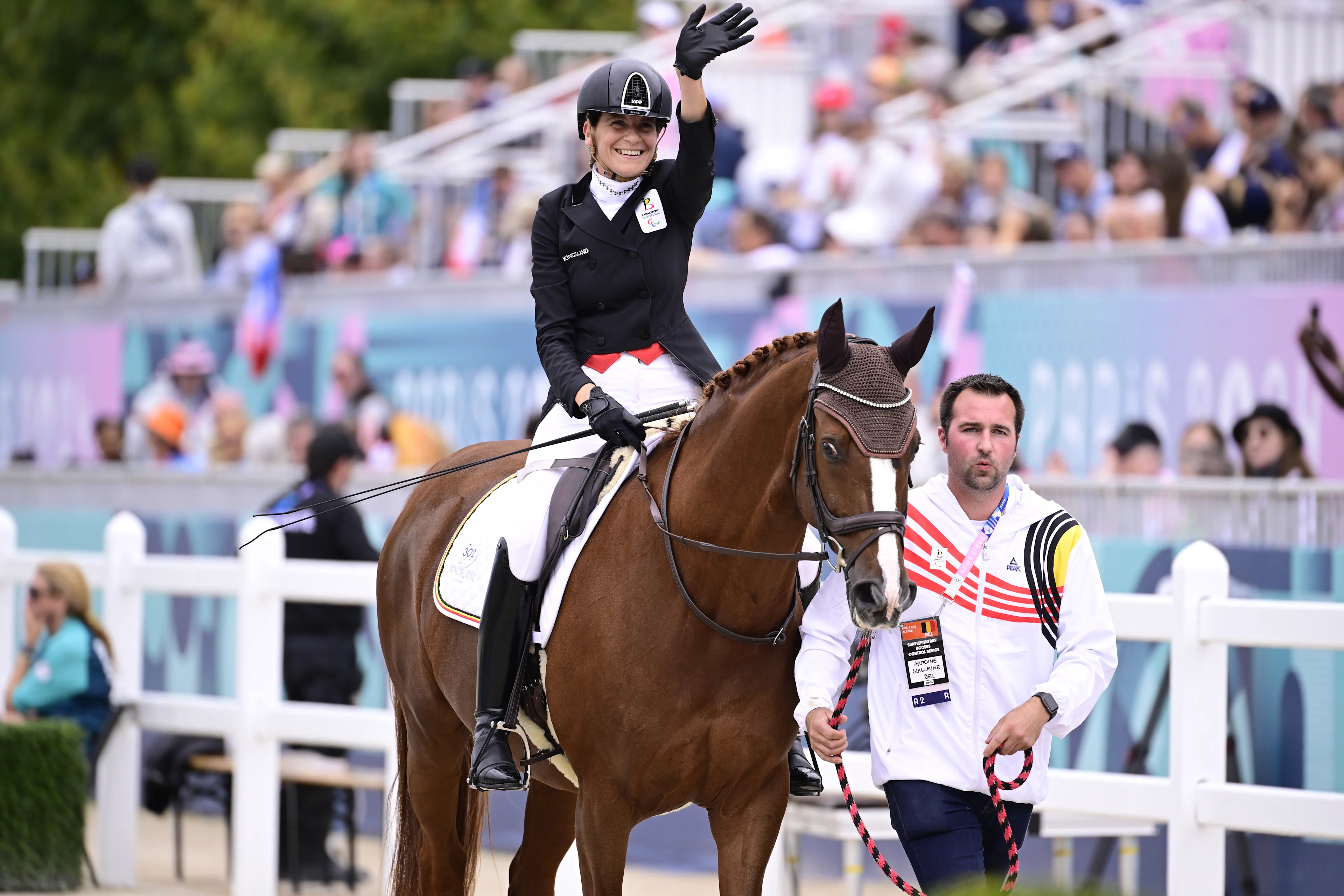 Belgian Barbara Minneci and her horse Stuart and groom Antoine Guillaume pictured at the Individual Freestyle Event Grade III equestrian event, on day 11 of the 2024 Summer Paralympic Games in Paris, France on Saturday 07 September 2024. The 17th Paralympics are taking place from 28 August to 8 September 2024 in Paris. BELGA PHOTO LAURIE DIEFFEMBACQ