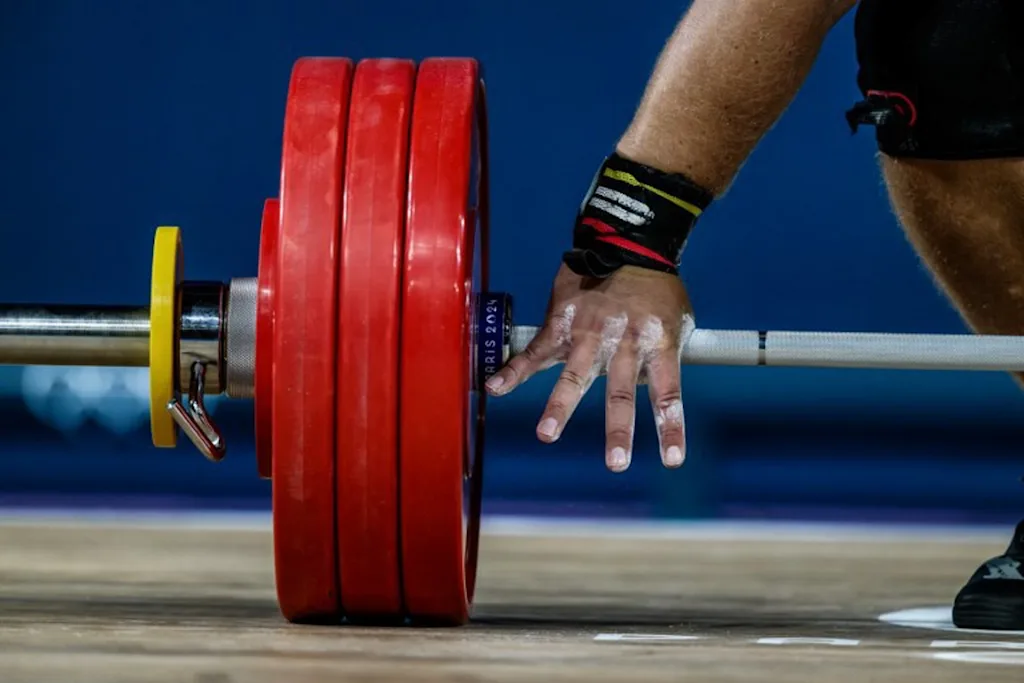 Estonia's Mart Seim competes in the men's +102kg weightlifting event during the Paris 2024 Olympic Games at the South Paris Arena in Paris, on August 10, 2024. JEFF PACHOUD / AFP