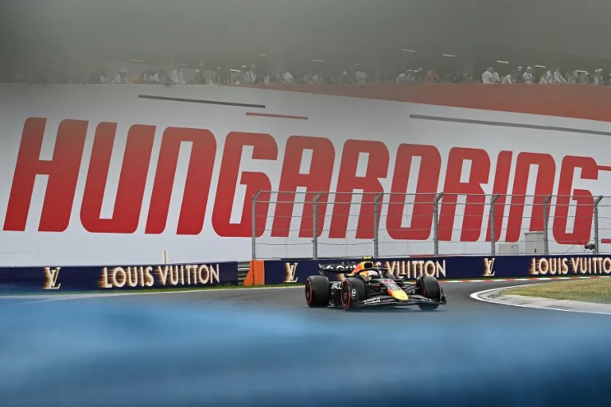 RB's Japanese driver Yuki Tsunoda competes during the qualifying session of the Formula One Hungarian Grand Prix at the Hungaroring circuit in Mogyorod, near Budapest, Hungary, on August 2, 2025. Attila KISBENEDEK / AFP