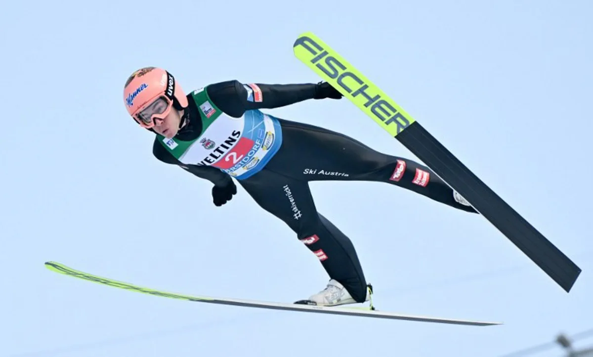 Austria's Stefan Kraft soars through the air during the training session of the Four Hills Ski Jumping tournament (Vierschanzentournee), in Oberstdorf, southern Germany, on December 29, 2024.  KERSTIN JOENSSON / AFP