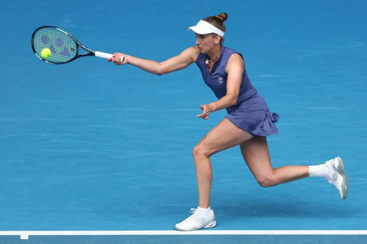 Belgium's Elise Mertens hits a return against USA's Jessica Pegula during their women's singles match on day four of the Australian Open tennis tournament in Melbourne on January 15, 2025.  Adrian DENNIS / AFP