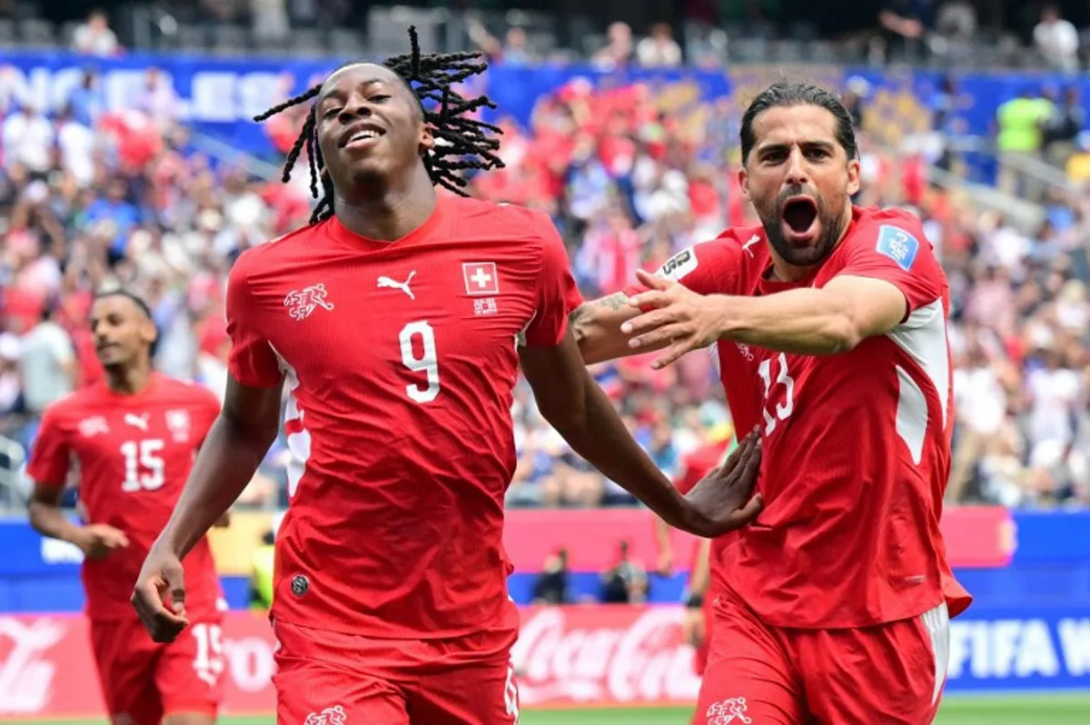 Switzerland's midfielder #09 Johan Manzambi celebrates scoring his team's third goal during the 2026 World Cup Group B football match between Switzerland and Bosnia and Herzegovina at Los Angeles Stadium in Inglewood on June 18, 2026. Frederic J. Brown / AFP