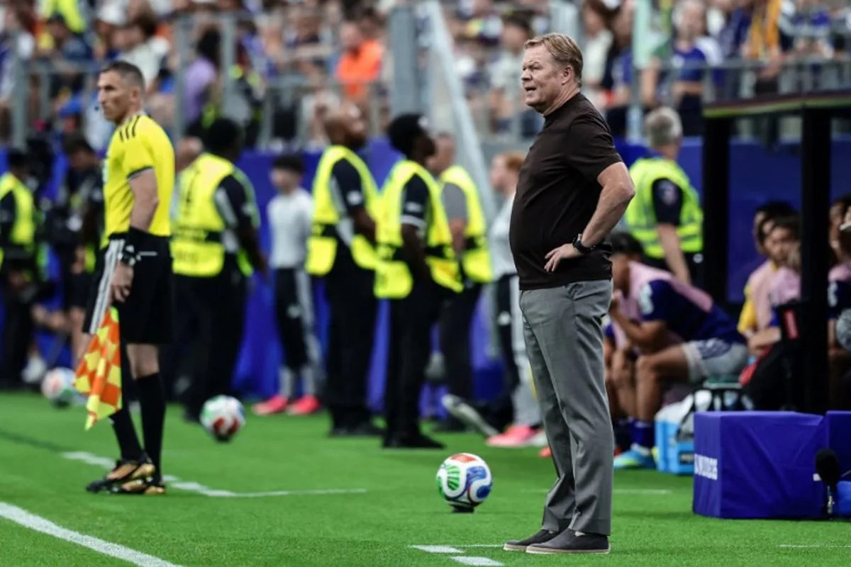 Netherlands' head coach Ronald Koeman stands on the pitch line during the 2026 World Cup Group E football match between Germany and Curacao at the Houston Stadium in Houston on June 14, 2026. Aric Becker / AFP