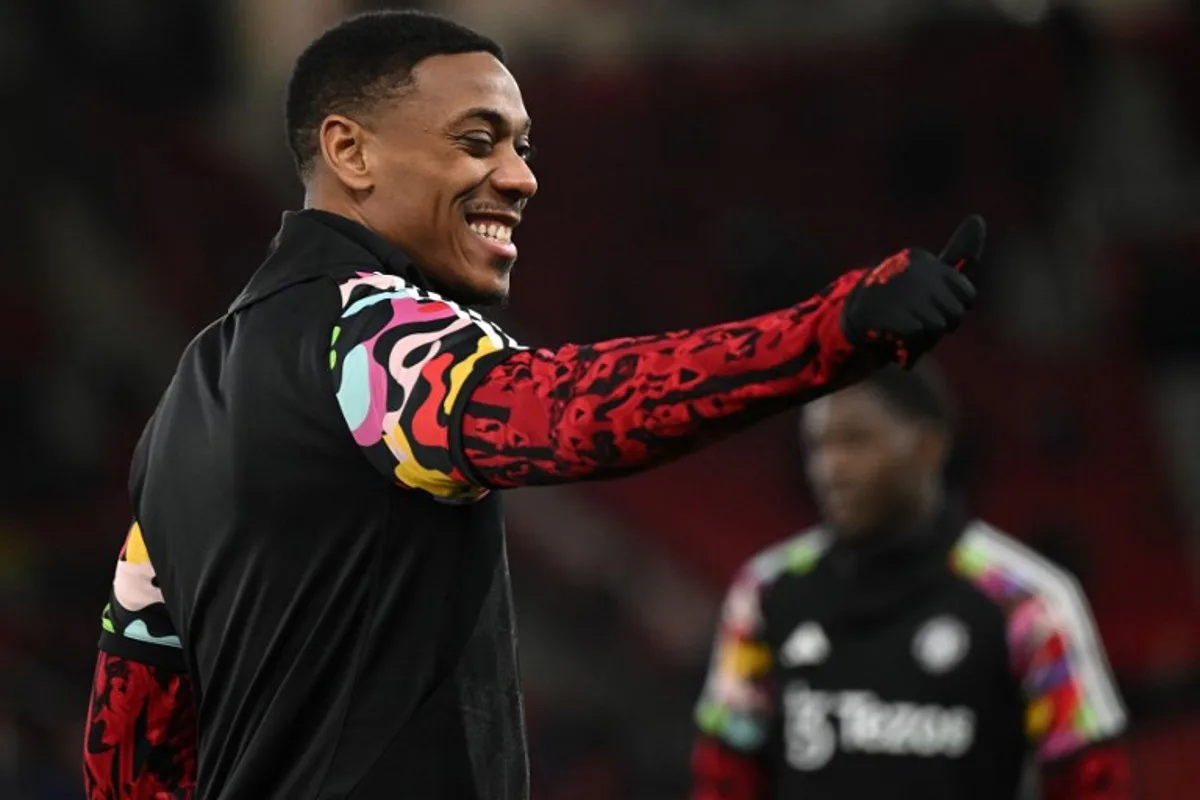 Manchester United's French striker #09 Anthony Martial warms up ahead of the English Premier League football match between Manchester United and Chelsea at Old Trafford in Manchester, north west England, on December 6, 2023.  Oli SCARFF / AFP