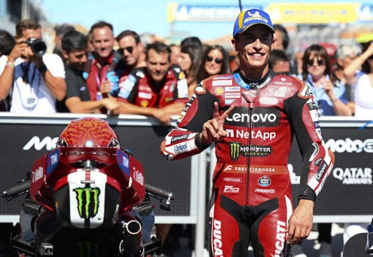 Team Ducati Lenovo Team's Marc Marquez celebrates his second place after the qualifying session of the MotoGP Aragon Grand Prix at the Motorland circuit in Alcaniz, northeastern Spain, on August 29, 2026. Jose Jordan / AFP