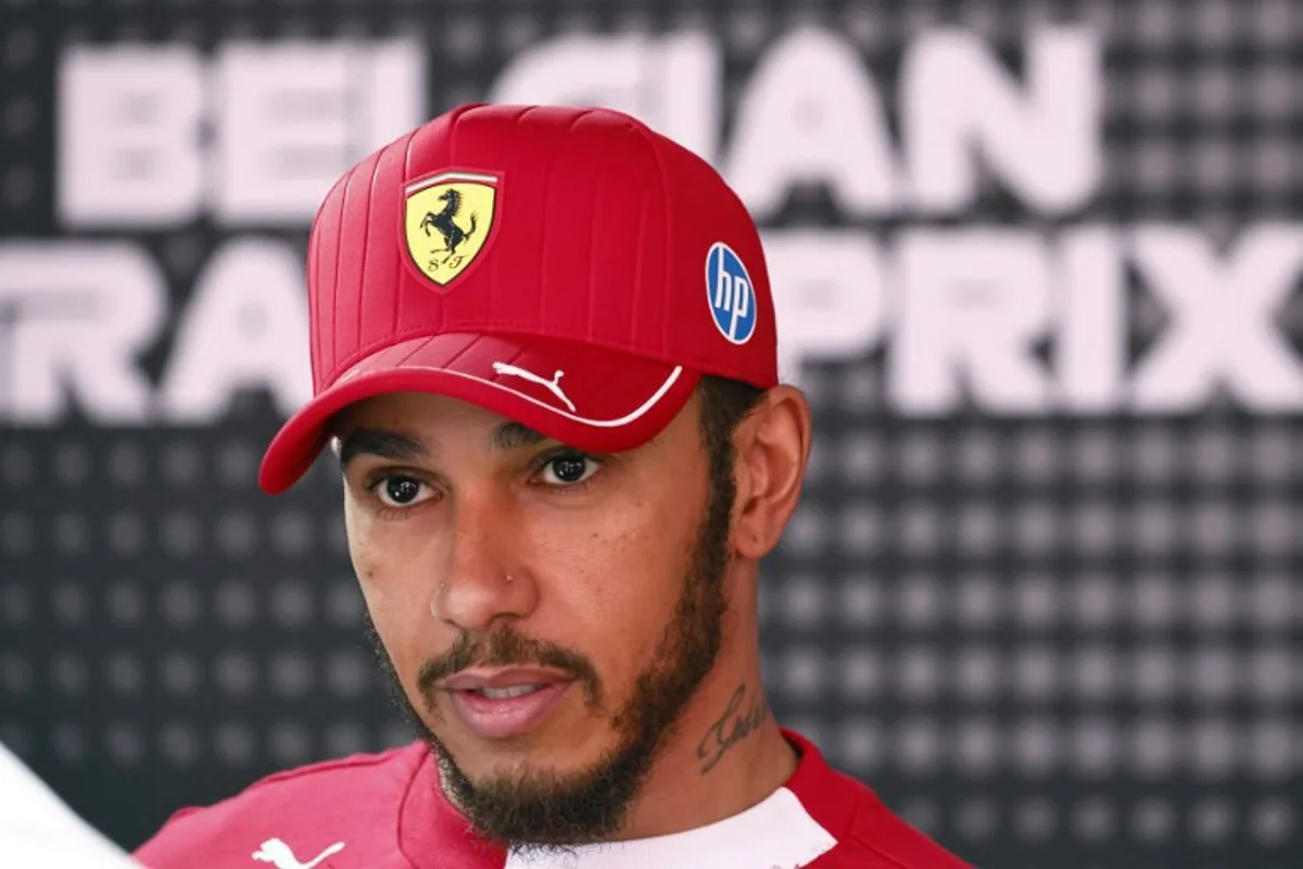Ferrari's British driver Lewis Hamilton looks on after the Sprint Race of the Formula One Belgian Grand Prix at the Spa-Francorchamps circuit in Spa, on July 26, 2025. SIMON WOHLFAHRT / AFP