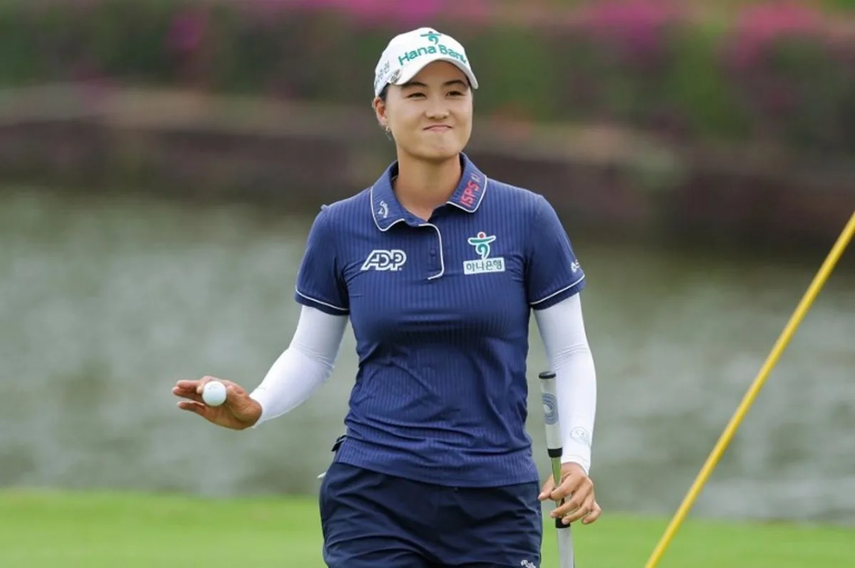 Australia's Minjee Lee reacts after a putt during the final round of the LPGA Blue Bay golf tournament at the Jian Lake Blue Bay Golf Club in Lingshui, on China's southern Hainan island on March 9, 2025. STR / AFP