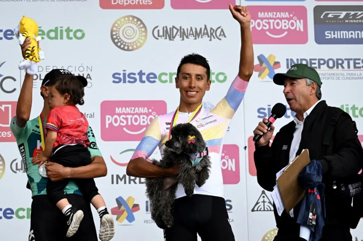 Colombia's cyclist Egan Bernal (C) celebrates on the podium after winning the National Road Cycling Championships in Zipaquira, Colombia, on February 8, 2026.  Raul ARBOLEDA / AFP
