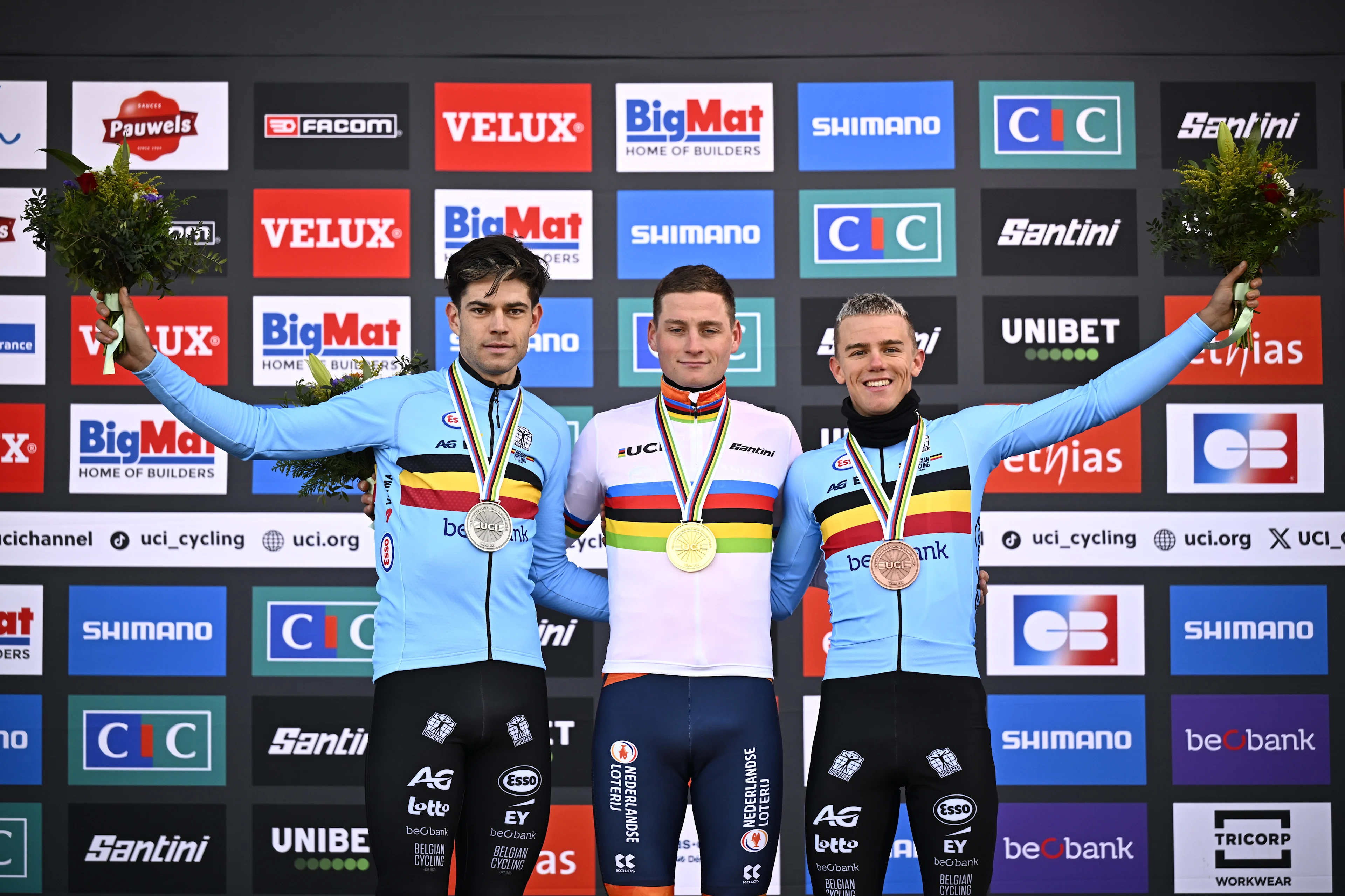 Belgian Wout van Aert, Dutch Mathieu Van Der Poel and Belgian Thibau Nys pictured on the podium after the elite men competition of the UCI cyclocross World Championship, in Lievin, France, Sunday 02 February 2025. The world championships are taking place from 31 January until 02 February. BELGA PHOTO JASPER JACOBS