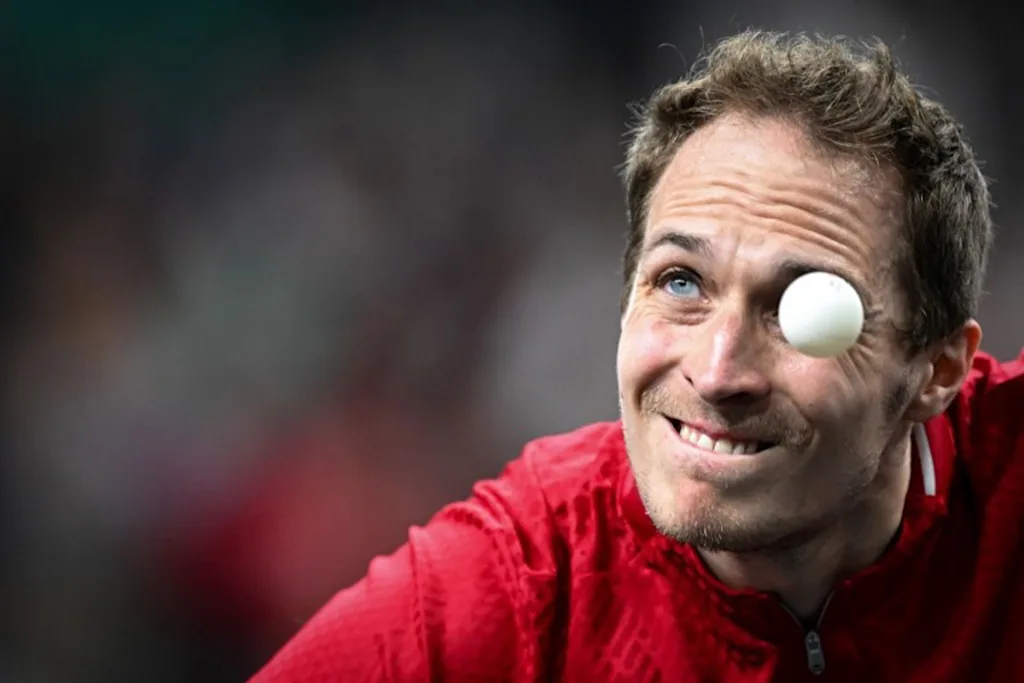 Belgium's Cedric Nuytinck eyes the ball as he plays a return against Sweden's Truls Moregard during their men's table tennis singles round of 64 at the Paris 2024 Olympic Games at the South Paris Arena in Paris on July 27, 2024. JUNG Yeon-je / AFP