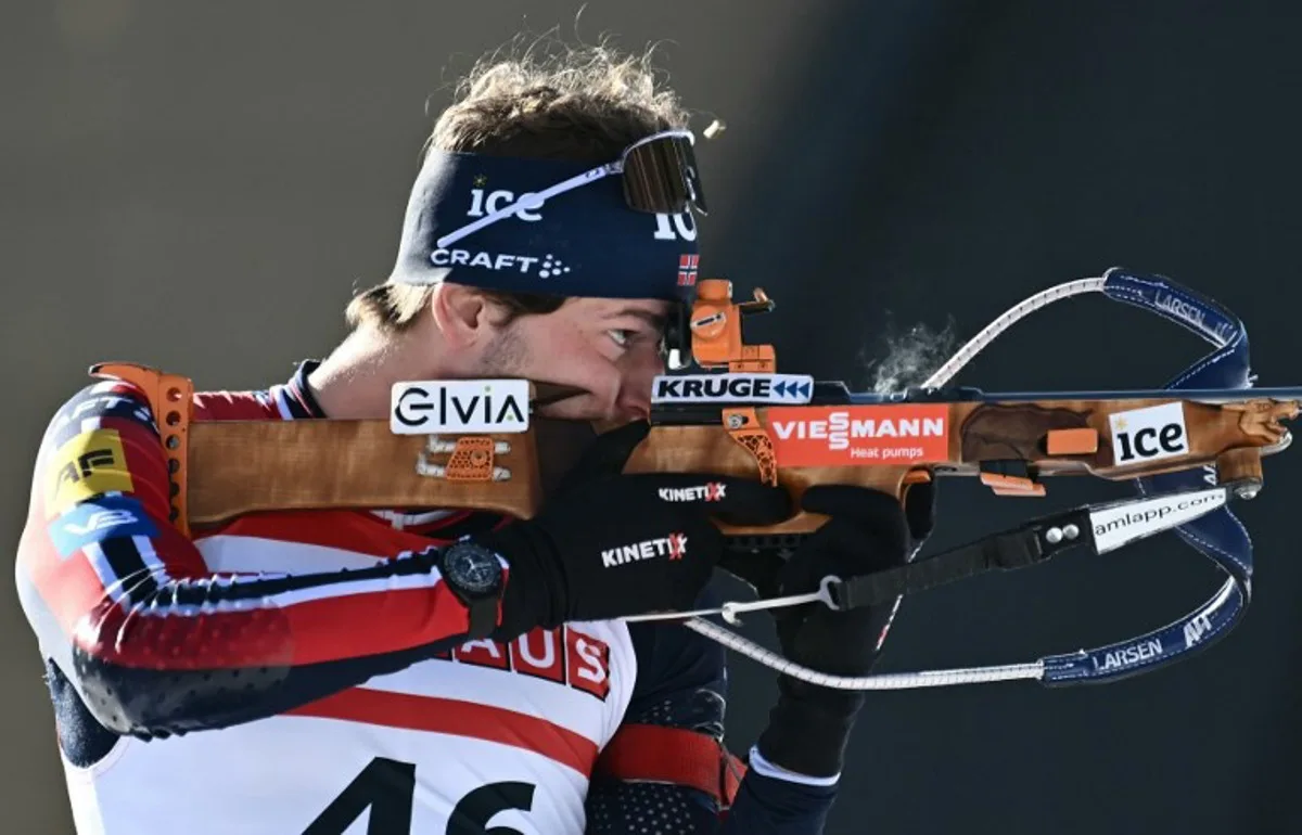 Norway's Sturla Laegreid prepares during the zeroing prior the start of the men's 10km sprint event of the IBU Biathlon World Cup in Antholz-Anterselva, Italy, on January 24, 2025.  Marco BERTORELLO / AFP