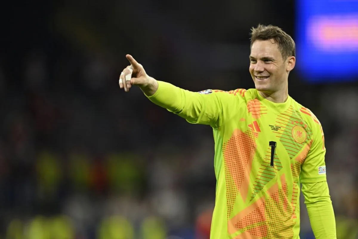 Germany's goalkeeper #01 Manuel Neuer celebrates his team's win at the end of the UEFA Euro 2024 round of 16 football match between Germany and Denmark at the BVB Stadion Dortmund in Dortmund on June 29, 2024. INA FASSBENDER / AFP