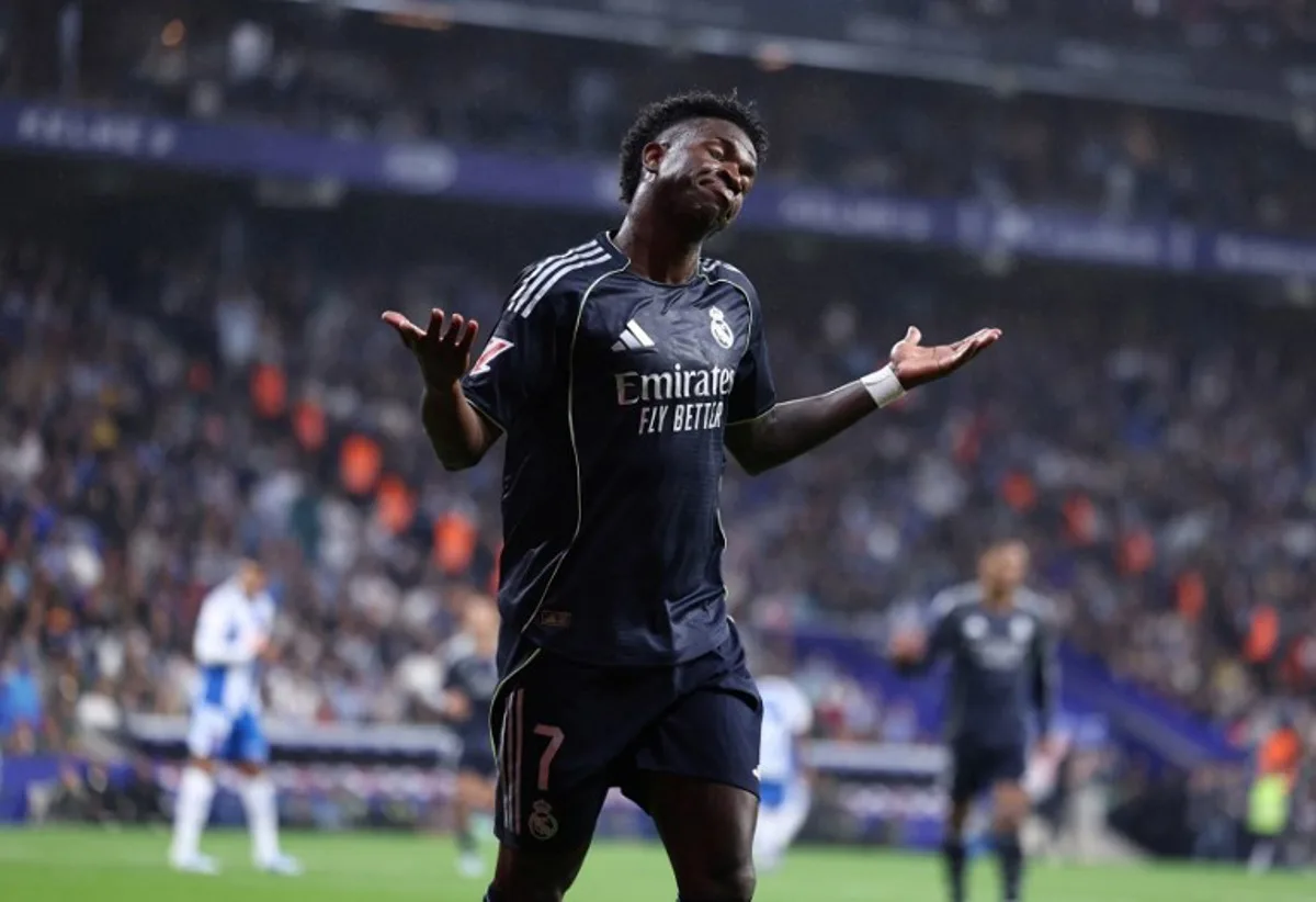 Real Madrid's Brazilian forward #07 Vinicius Junior reacts during the Spanish league football match between RCD Espanyol and Real Madrid CF at RCDE Stadium in Cornella de Llobregat on May 3, 2026. Josep LAGO / AFP